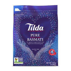 Tilda Pure Basmati rice grains in a bag with fragrant aroma and fluffy texture.