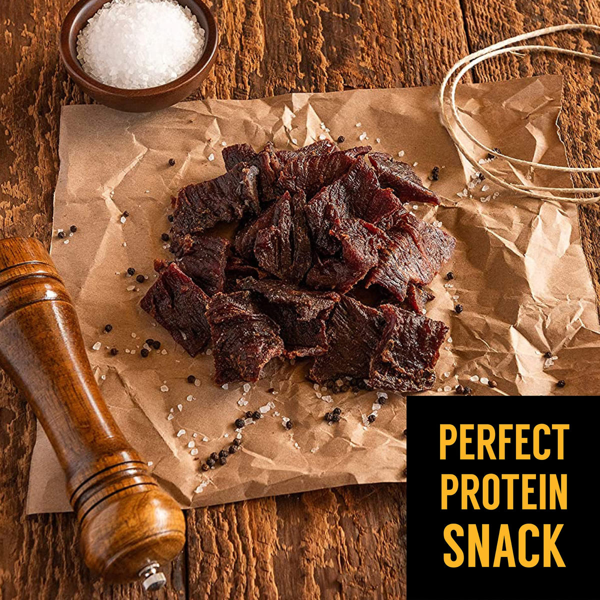 Tillamook Country Smoker Peppered Slab beef jerky closeup slices, premium quality and peppery bite.