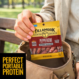 Tillamook Pepperoni Smoked Sausages close-up of real hardwood smoke delivering a deep aroma.