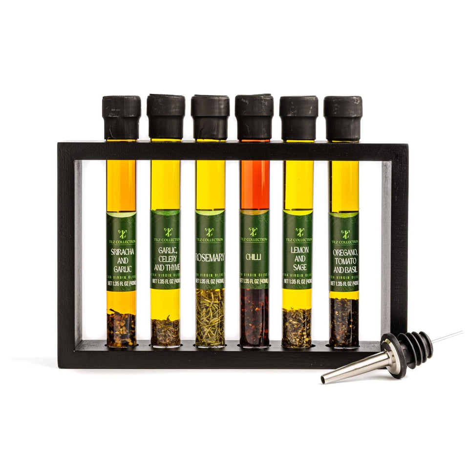 Tilz Collection Basil Oil bottle with fresh basil; enhances pasta and salads with aromatic herb flavor.