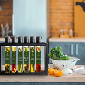 Tilz Collection Garlic Oil bottle releasing savory notes; ideal for sautés and roasted vegetables.