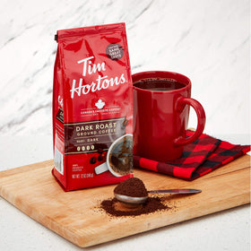 Tim Hortons cup of coffee, black or with milk, ready to enjoy.
