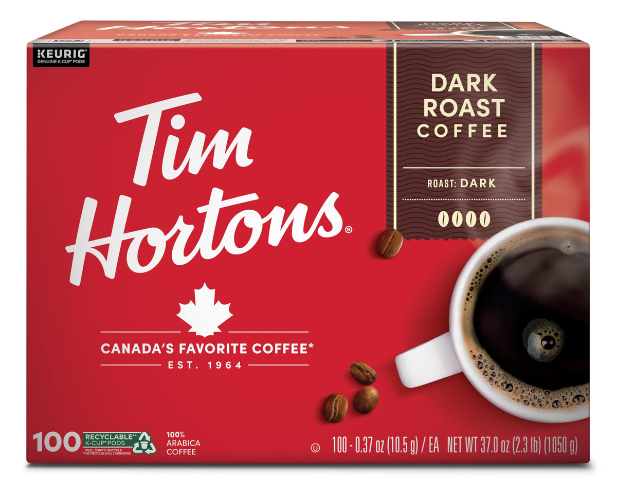 Tim Hortons dark roast K-Cup pod pouring into a mug to start the day with bold flavor.