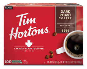 Tim Hortons dark roast K-Cup pod pouring into a mug to start the day with bold flavor.