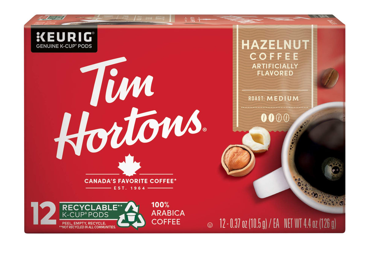 Tim Hortons hazelnut coffee being poured into a mug for a comforting moment.