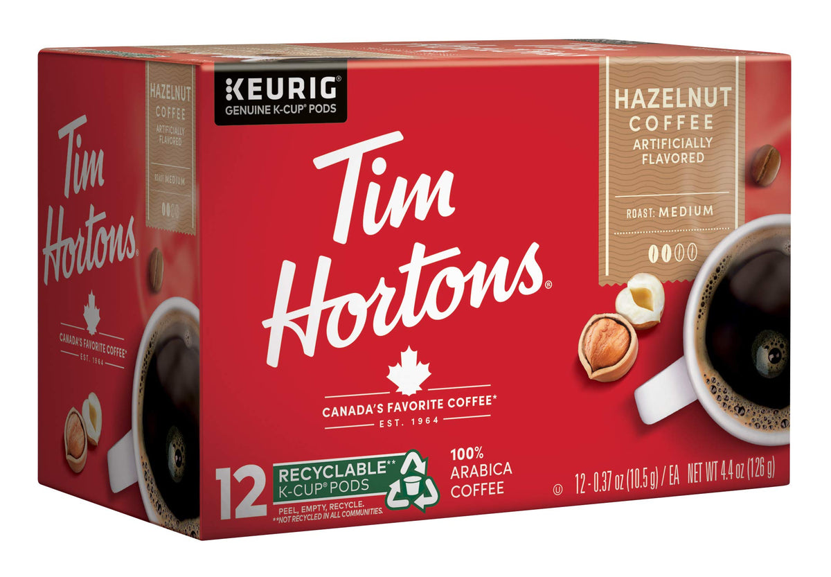 Keurig brewer with Tim Hortons hazelnut K-Cup ready to brew.