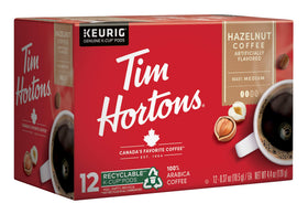 Keurig brewer with Tim Hortons hazelnut K-Cup ready to brew.