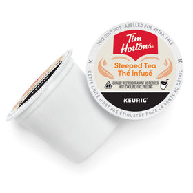 Tim Hortons orange pekoe tea pods loaded in a Keurig brewer for quick cup