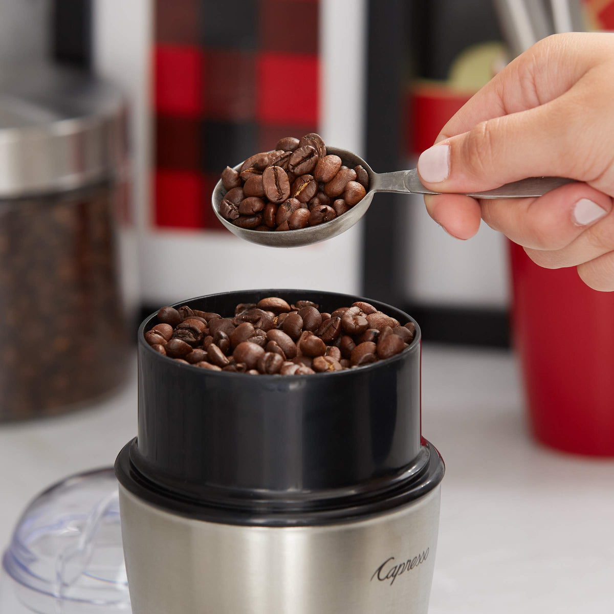 Tim Hortons Original Blend beans being ground for automatic coffee maker