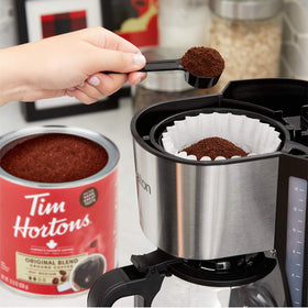 French press scene with Tim Hortons Original Blend for a rich, full-bodied brew.