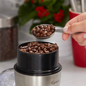 Tim Hortons Original bag open with whole beans, fresh aroma ready to grind.