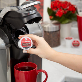 Tim Hortons pod recycling concept with coffee grounds, supporting eco-friendly habits.