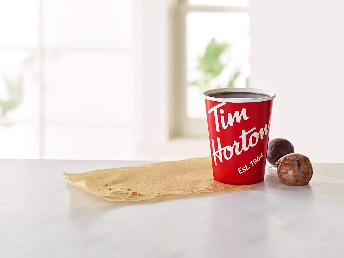 Espresso cup with Tim Hortons T-Discs for quick morning ritual.