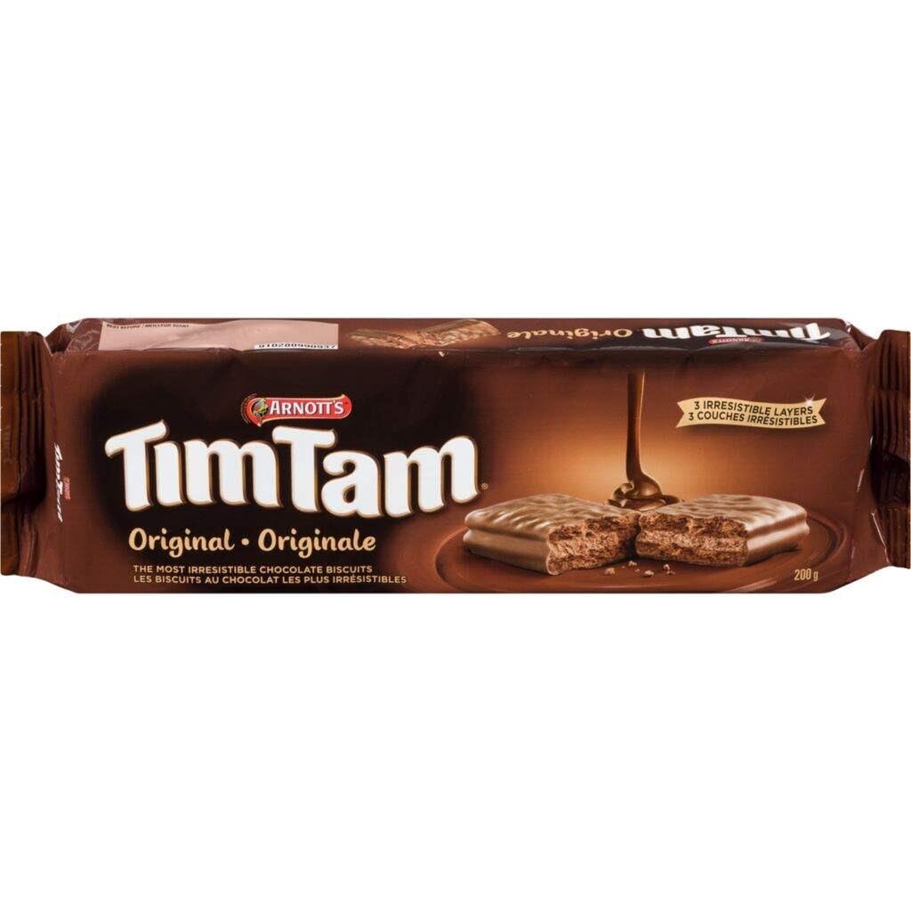 Tim Tam milk chocolate cream sandwich close-up for a smooth tasting experience.