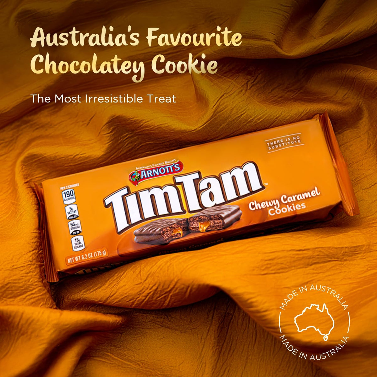 Stacked Tim Tam cookies with glossy chocolate coating on a clean surface.