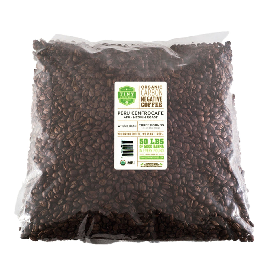 Tiny Footprint Coffee Peru APU whole bean with caramel and citrus notes.