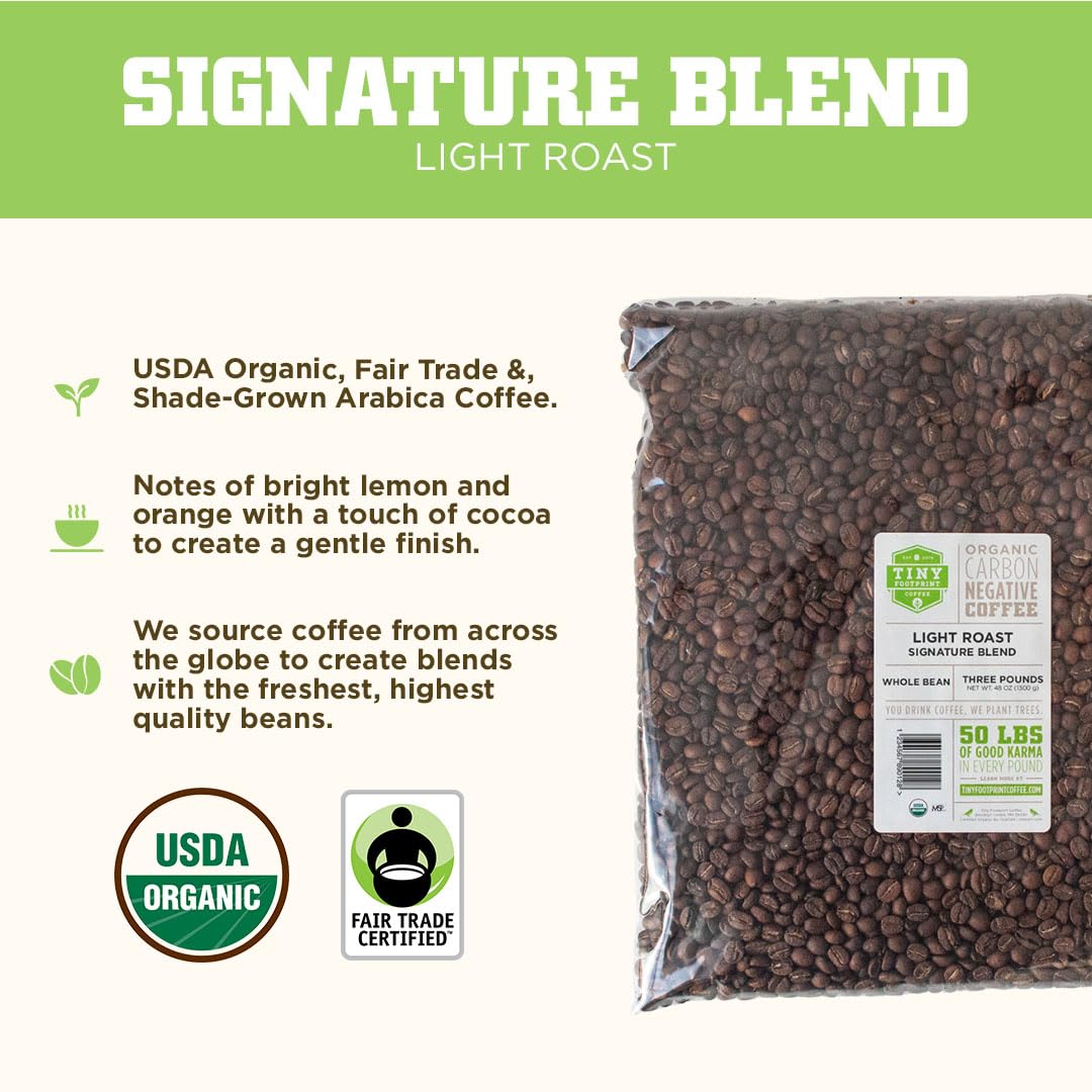 Tiny Footprint Coffee Signature Blend Light Roast beans close-up shows organic quality and sustainable sourcing.