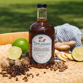Label showing all-natural ingredients like cane sugar and ginger in Tippleman's falernum