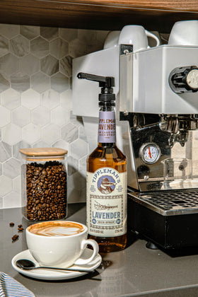 Tippleman's Lavender Syrup in a latte cup adding floral sweetness.