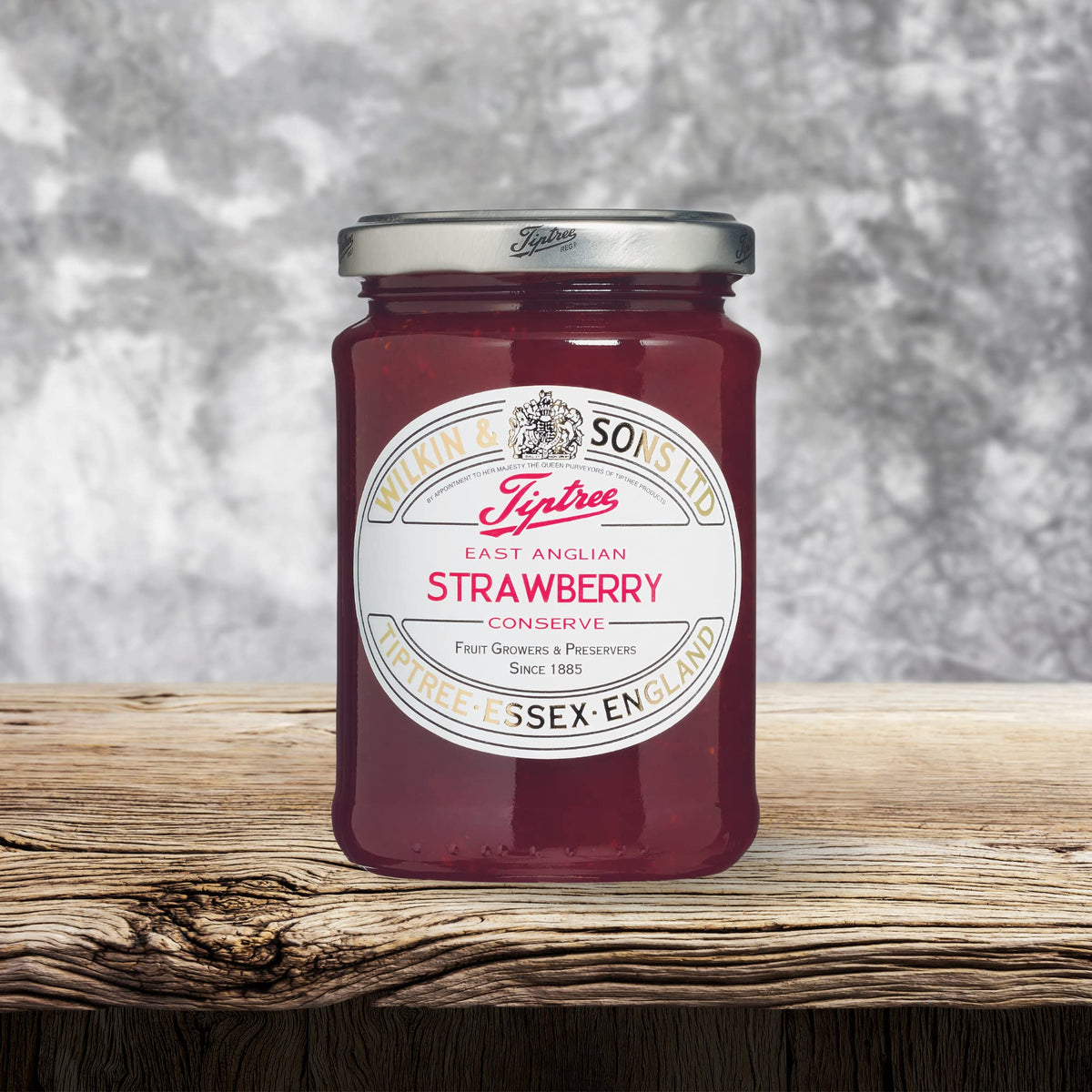 Toast with conserve beside a sunny window for a simple breakfast moment.