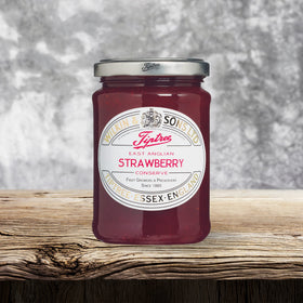 Toast with conserve beside a sunny window for a simple breakfast moment.