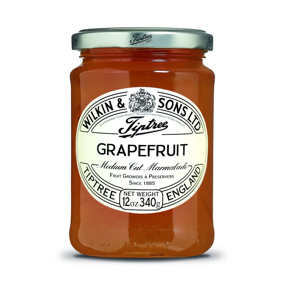 Tiptree Grapefruit Marmalade jar, ideal for toast and pastries with bright citrus flavor.