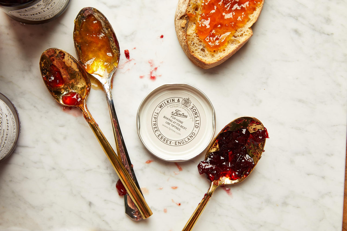 Tiptree Green Gooseberry Preserve label close-up, gluten-free and vegan friendly.