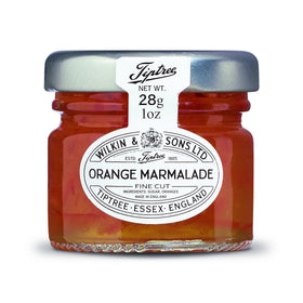 Tiptree Orange Marmalade Minis on toast, smooth spread and bright color.