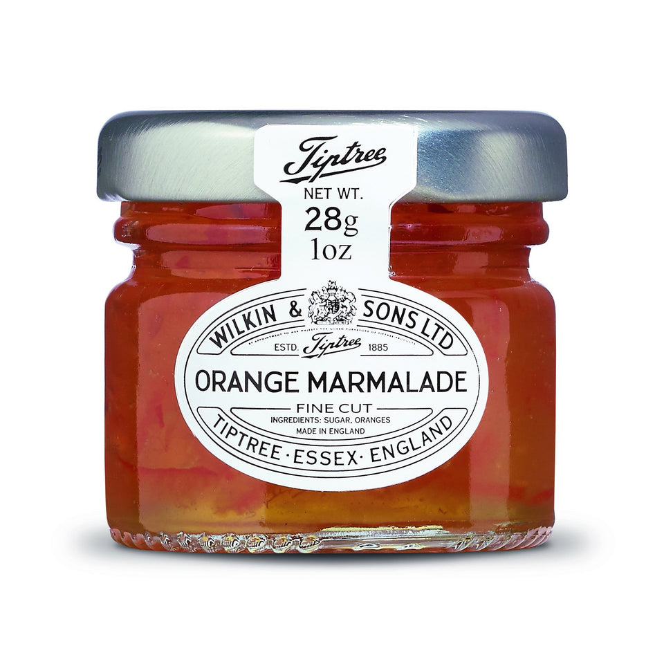 Tiptree Orange Marmalade Minis on toast, smooth spread and bright color.