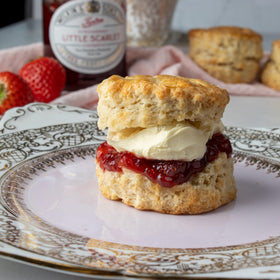 Spoonful of Tiptree Little Scarlet on toast, ready to enjoy.