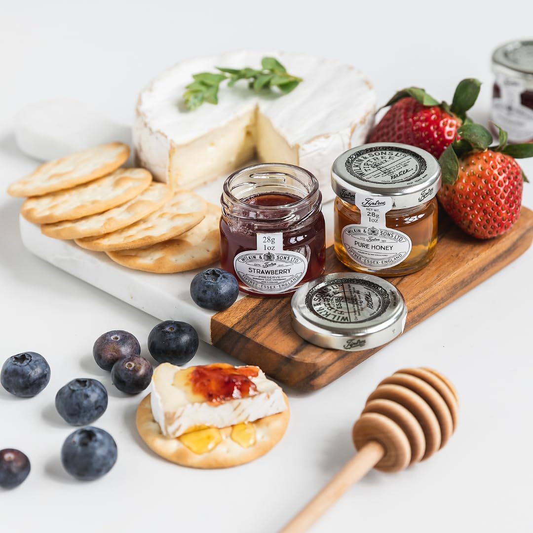 Tiptree Minis open jar showing rich strawberry spread and aroma