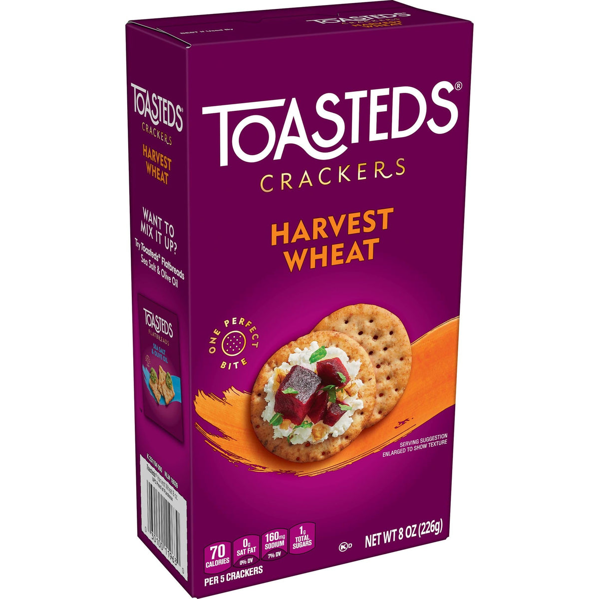 Toasteds Harvest Wheat crackers beside a cheese and hummus spread.
