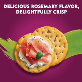 Toasteds Rosemary and Olive Oil crackers close-up showing toasted edges and herb aroma.
