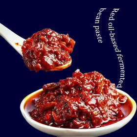 TOEISUXA Doubanjiang glass-jar-closeup highlights vivid paste for quick flavor boosts.