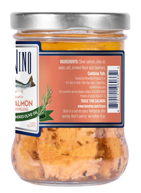Tonnino Silver Salmon being poured with olive oil, showcasing premium quality and flavor.