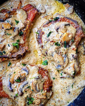 Pouring Tony Chachere's No Salt Seasoning on grilled chicken for flavor
