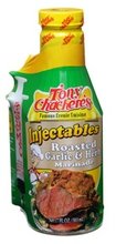 Tony Chachere's Marinade & Inj Garlic Herb bottle pouring for flavorful grilling