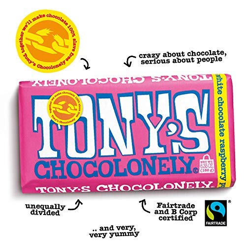 Closeup of Tony's Chocolonely white chocolate raspberry popping bar, fruity notes and fizz excite the palate.