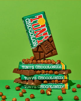 Tony's Chocolonely Milk Hazelnut Bar uneven pieces show a bold fairness statement.