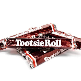 Close-up of Tootsie Roll Bars showing a chocolatey, chewy bite.
