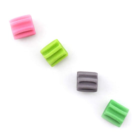 Tootsie Roll Dubble Bubble original gum piece close-up, classic pink twist for nostalgia.