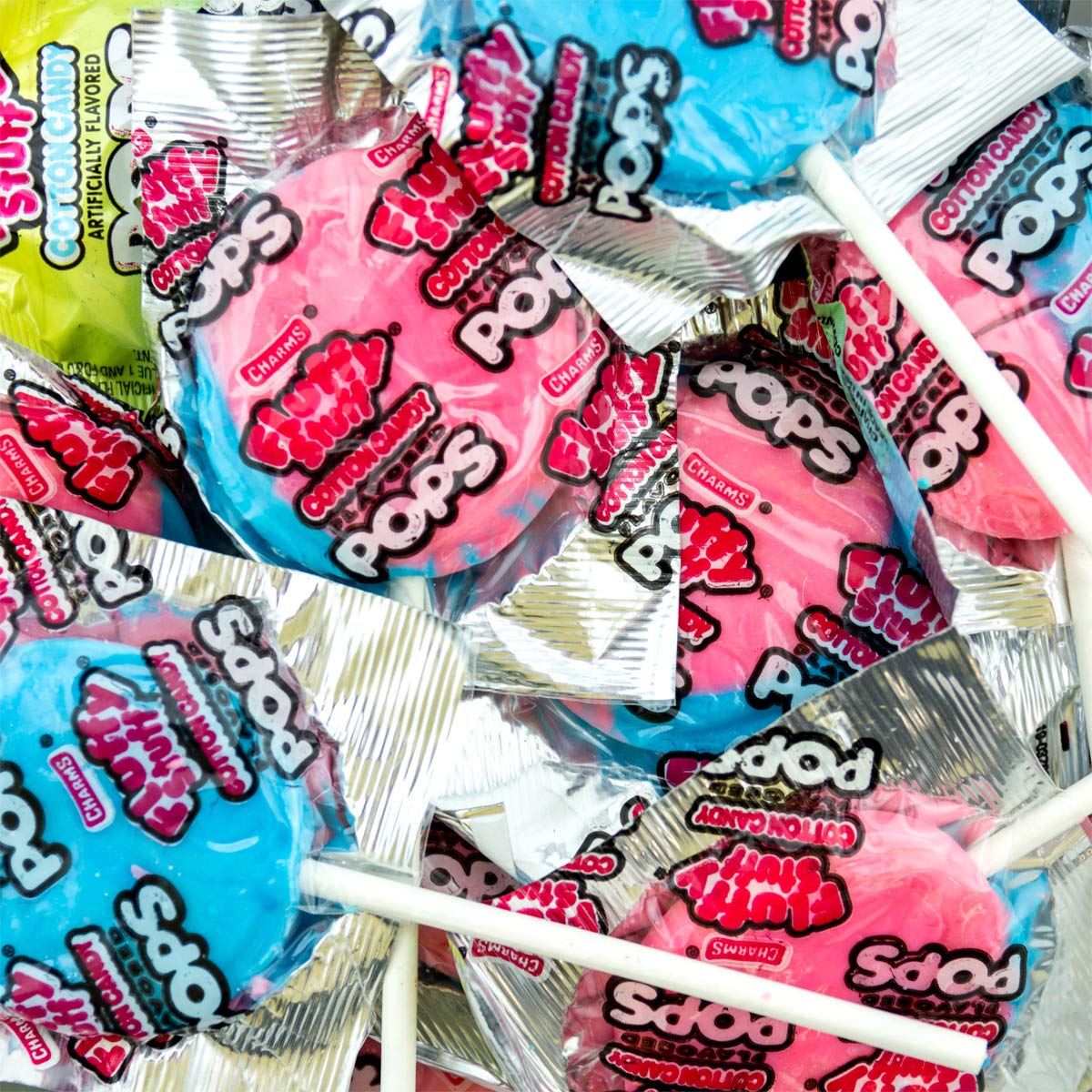 Tootsie Roll Fluffy Stuff cotton candy pops on kitchen counter, easy snack.