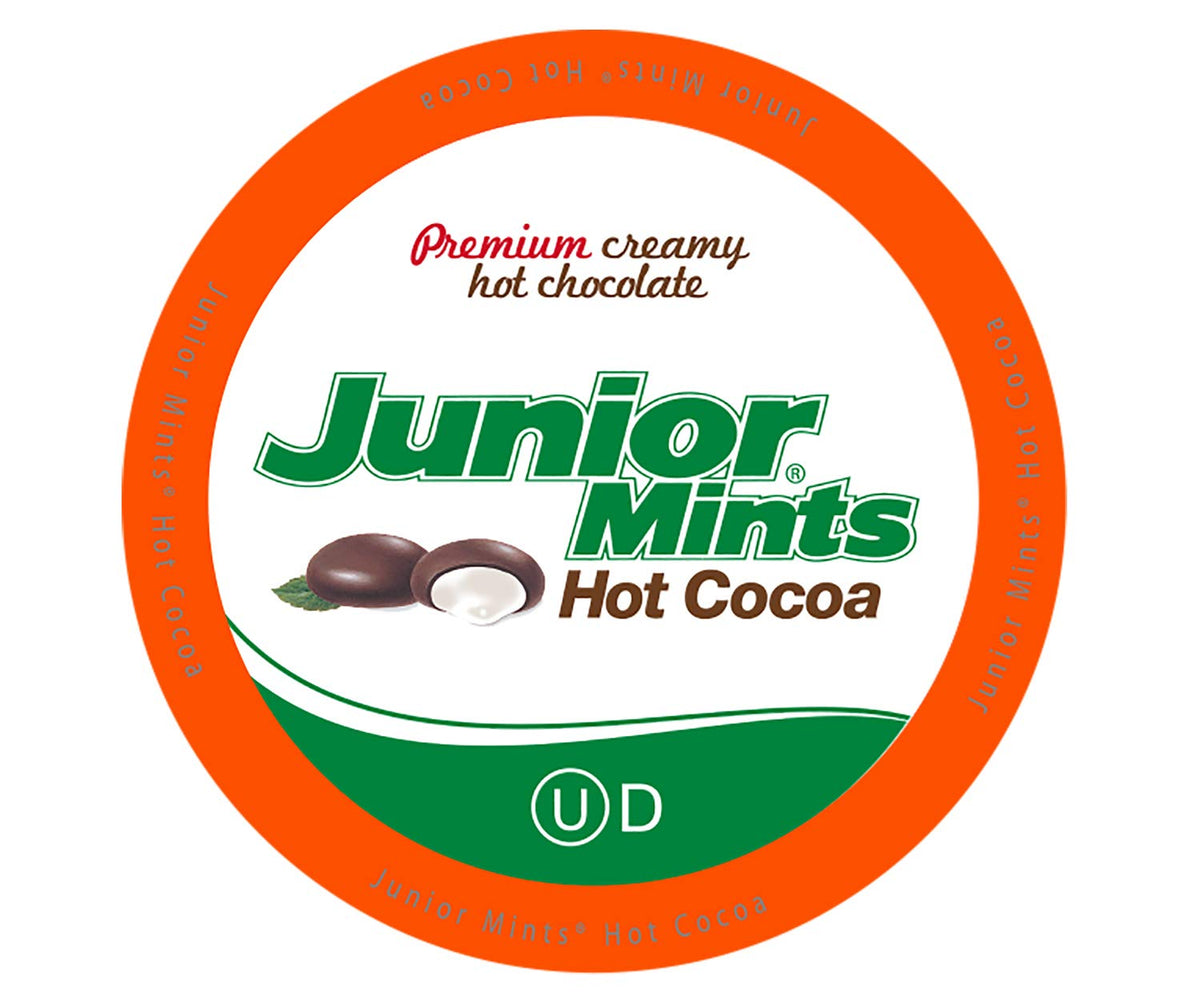 Tootsie Roll Junior Mints hot cocoa pods beside a mug for easy brewing.