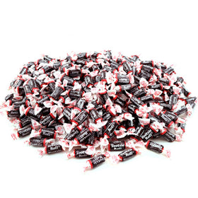 Tootsie Roll Midgees close-up showing chewy chocolate texture.