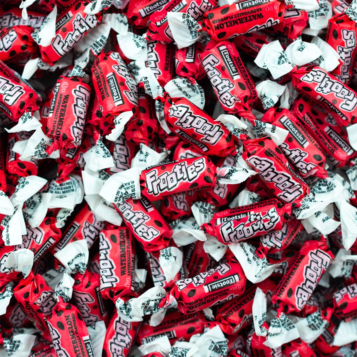Tootsie Roll Watermelon Frooties close-up candies, juicy pink treats ideal for party tables.