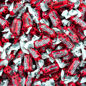 Tootsie Roll Watermelon Frooties close-up candies, juicy pink treats ideal for party tables.