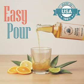 Top Hat Provisions Agave Nectar mocktail setup with fresh lemons.