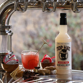 Top Hat Provisions at-home-bar recipe guide included behind bottle.