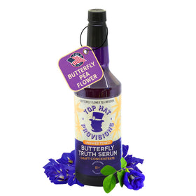 Top Hat Provisions Butterfly Truth Serum bottle front shows vivid indigo hue for cocktails.