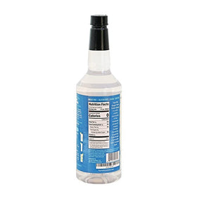 Top Hat Provisions tonic syrup bottle close-up, ideal for quick at-home cocktails.